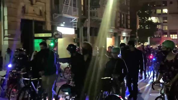 Demonstrators march in Manhattan