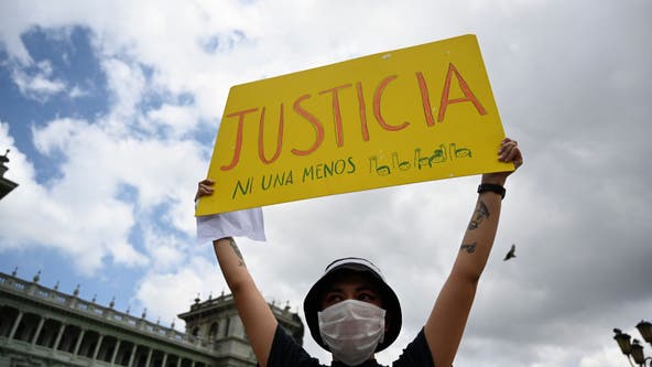 Protesters burn part of Guatemala's Congress building amid budget cuts to education, health spending