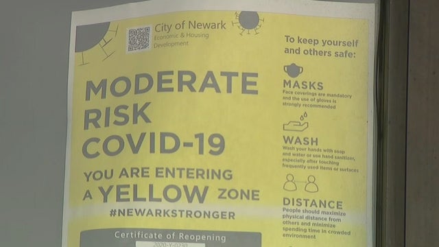 Newark imposes curfew as virus surges