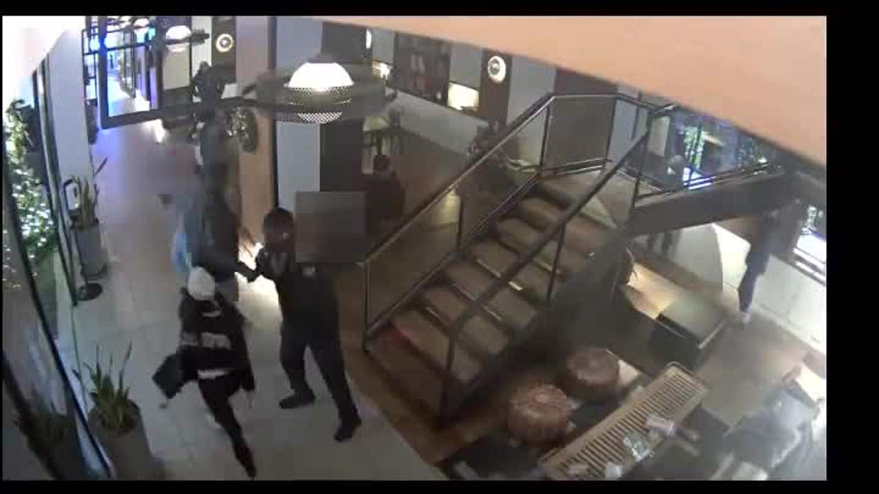 Woman assaults boy in lobby