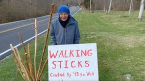 Retired Air Force colonel, 93, whittles walking sticks to raise money for food bank
