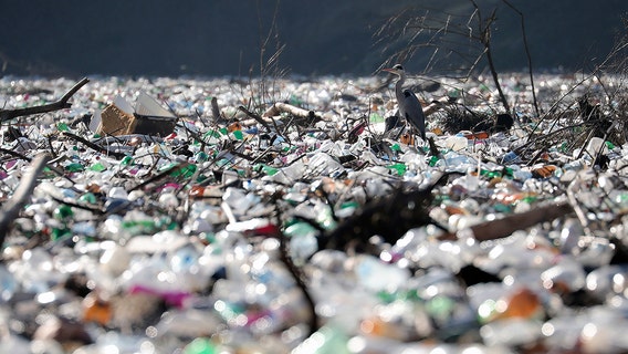 Islands of garbage clog rivers, threaten dam in the Balkans