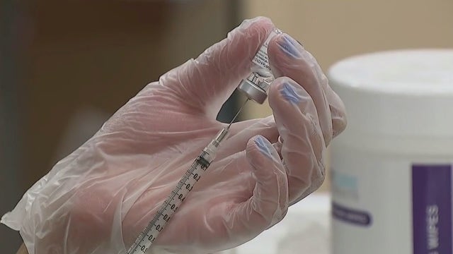 Nursing home celebrates New Year's Day with vaccinations