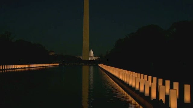 Biden pays tribute to pandemic victims in National Mall ceremony