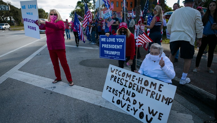 Trump supporters 'welcome home' former president to Mar-a-Lago