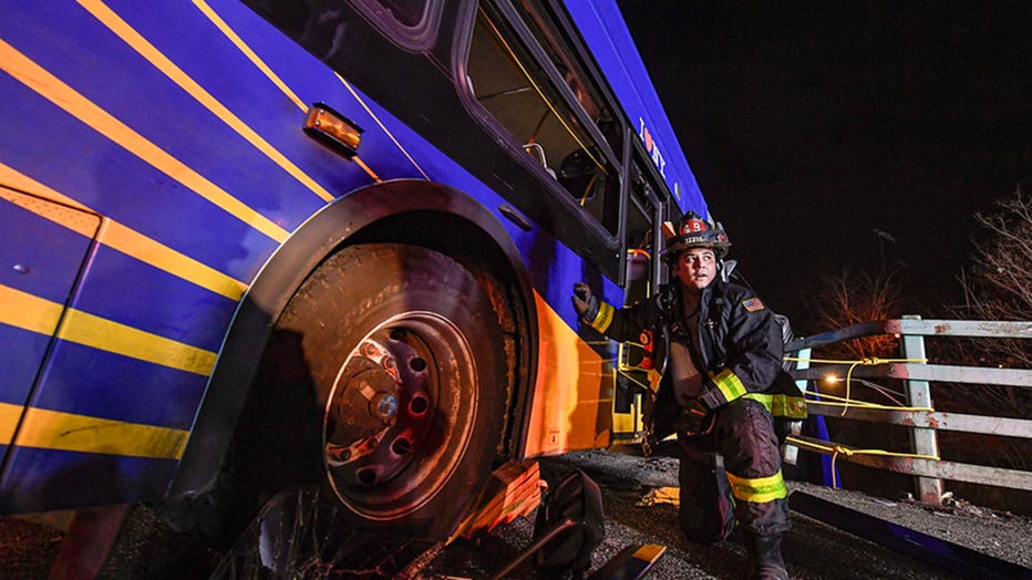Bus careens off road, dangles from Bronx overpass injuring 8