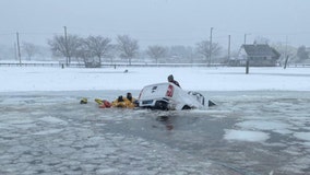 Truck plunges into water in Connecticut during snowstorm