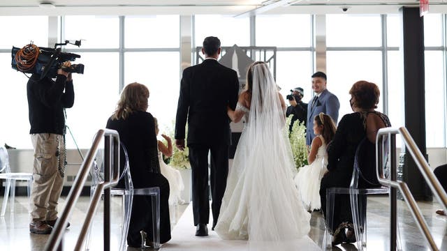 NY mandates dance 'zones,' distancing when weddings resume