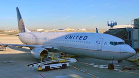 United Airlines flight diverted after man allegedly bites passenger’s ear, police say