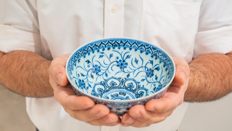 Blue and white porcelain bowl with floral pattern