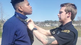 ‘This is the way it should be’: Tennessee police officer helps teens with their ties for senior photos