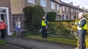 100-year-old woman dances as Irish police serenade her with celebratory saxophone tune