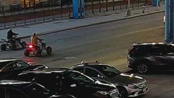 Bullets fly as gunmen on ATVs exchange fire with suspect on street