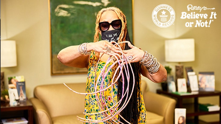 Woman with world's longest nails cuts them after 30 years - Vimarsana News