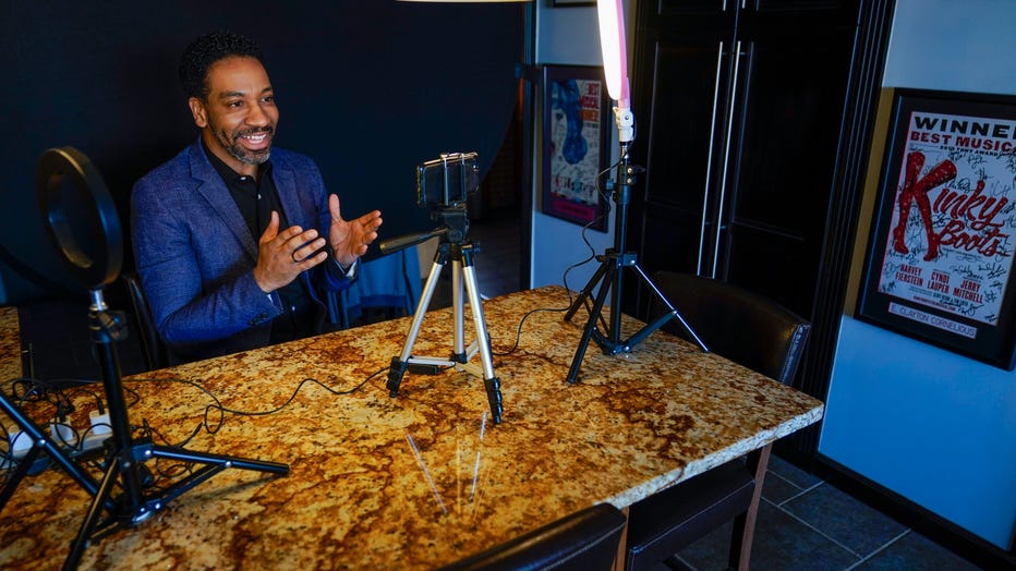 Actor E. Clayton Cornelious poses for a photo in the makeshift studio set up in his home for auditioning, Monday, March 22, 2021, in New York. 