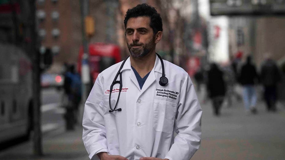 Emergency room Dr. Joseph Habboushe pauses during an interview Friday, Feb. 26, 2021, in New York.