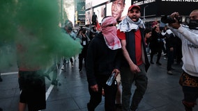 Pro-Israel and pro-Palestine supporters clash in Times Square