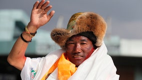 Sherpa guide climbs Mount Everest for record 25th time