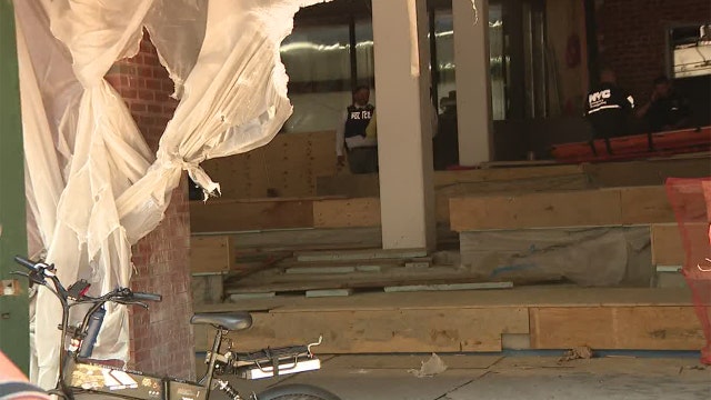 1 dead, 1 critically injured after elevator falls in building under construction