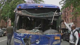 Bus removed from Brooklyn brownstone after crash