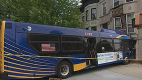 Days later and MTA bus remains stuck in Brooklyn brownstone