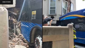 Bus slams into Brooklyn townhouse