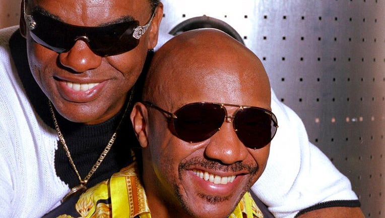 FILE - In this Aug. 1, 2001, file photo, the Rock and Roll Hall of Fame-inducted group, The Isley Brothers Ronald, left, and Ernie pose in New York.