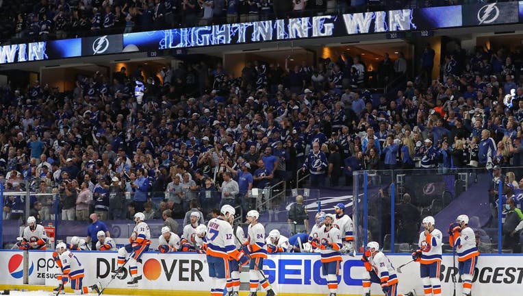 The New York Islanders react after their 1-0 loss against the Tampa Bay Lightning