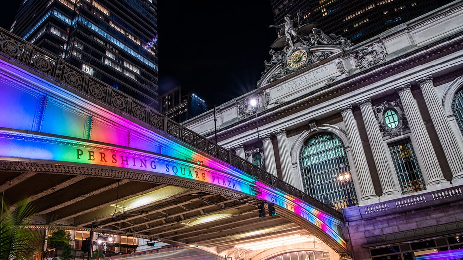 Viaduct outside Grand Central illuminated in Pride colors