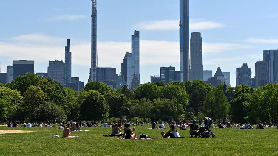 NEW YORK, NEW YORK - MAY 25: People sit on The Great Lawn in Central Park on Memorial Day during the coronavirus pandemic on May 25, 2020 in New York City.