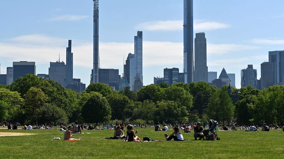 NEW YORK, NEW YORK - MAY 25: People sit on The Great Lawn in Central Park on Memorial Day during the coronavirus pandemic on May 25, 2020 in New York City. 