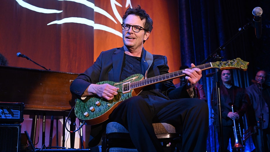 Michael J. Fox performs on stage at A Funny Thing Happened On The Way To Cure Parkinson's benefitting The Michael J. Fox Foundation on November 16, 2019 in New York City. (Photo by Noam Galai/Getty Images for The Michael J. Fox Foundation)