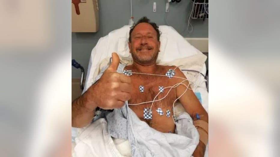 Michael Packard, 56, recovers in a Cape Cod hospital after being swallowed by a humpback whale Friday off the coast of Massachusetts. (Packard family)