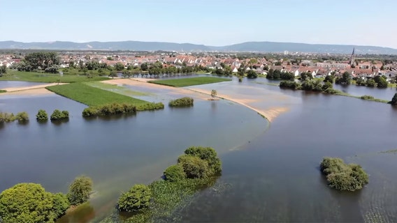 German officials defend their actions on devastating floods