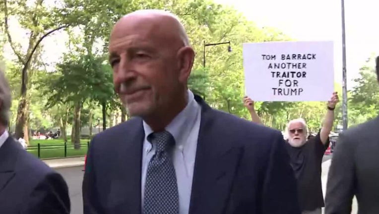 Protester heckles Barrack outside court