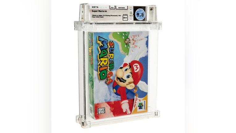 A Super Mario 64 game cartridge inside a plastic case