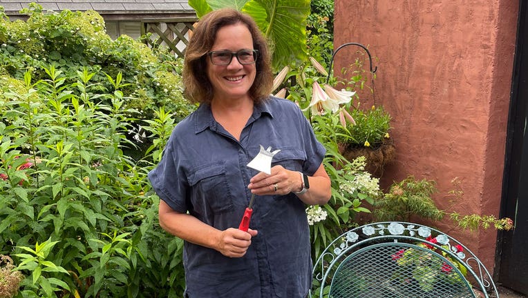 Elizabeth Licata, moderator of the Facebook group, WNY Gardeners, poses for a photograph on July 8, 2021 in Buffalo, N.Y. (Elizabeth Licata via AP)