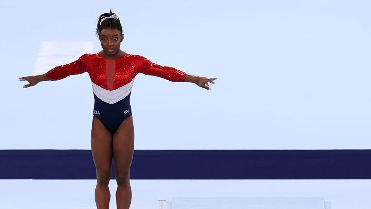 Simone Biles of Team United States competes on vault during the Women's Team Final on day four of the Tokyo 2020 Olympic Games at Ariake Gymnastics Centre on July 27, 2021 in Tokyo, Japan. (Photo by Jamie Squire/Getty Images)