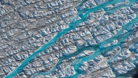 Rain falls atop Greenland's ice sheet for first time on record