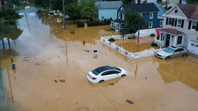Henri lingers over US Northeast, bringing more rain and flood risk