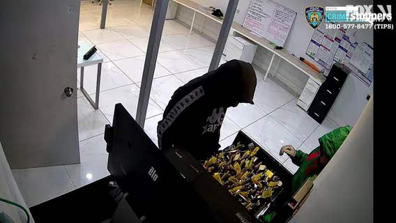 NYPD: Robbers break into car dealer, attack guard