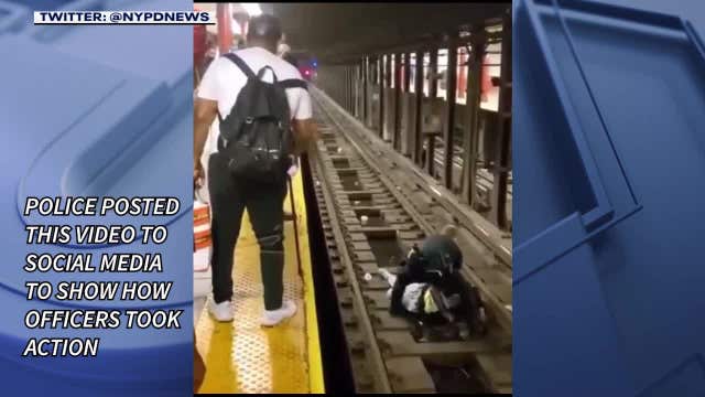 Cop, bystander jump on subway tracks to save unconscious man