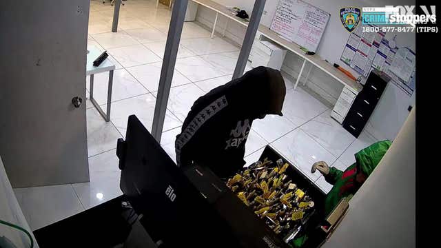 NYPD: Robbers break into car dealer, attack guard