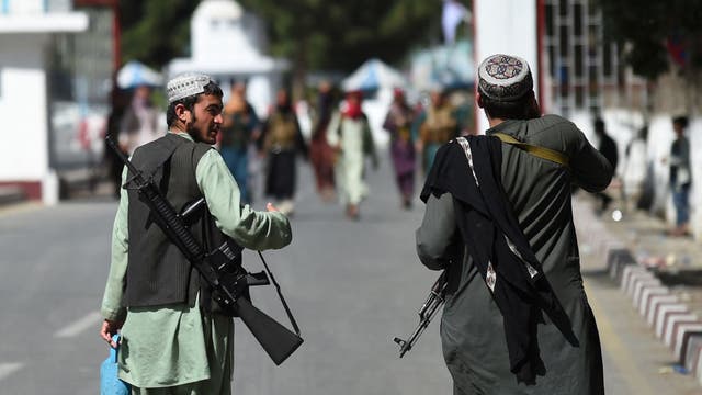Taliban hang dead body in Afghan city's main square