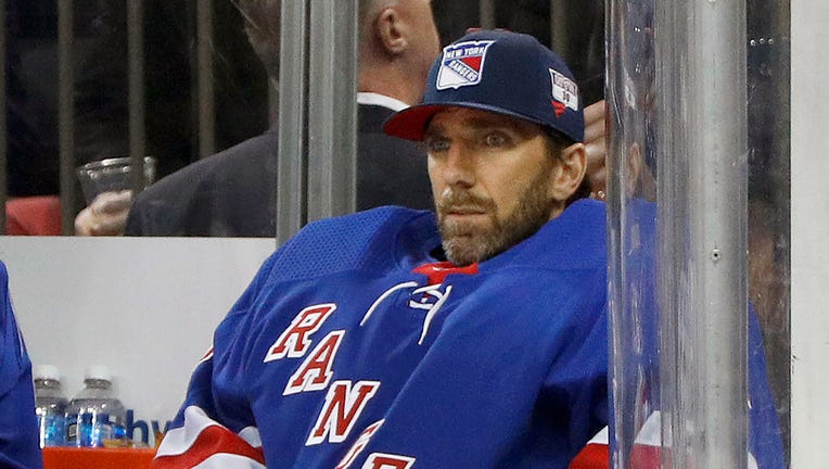 FILE - Then-New York Rangers goaltender Henrik Lundqvist looks on from the bench during an NHL hockey game against the Buffalo Sabres in New York, in this Friday, Feb. 7, 2020, file photo.