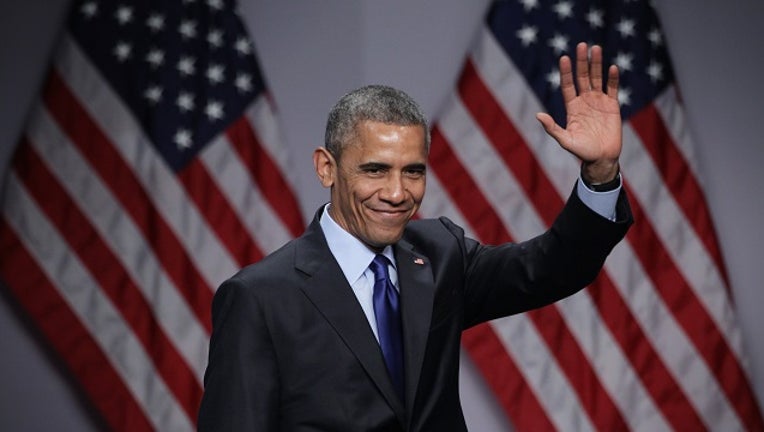 U.S. President Barack Obama waves after he spoke during the SelectUSA Investment Summit March 23, 2015 in National Harbor, Maryland.(Photo by Alex Wong/Getty Images)