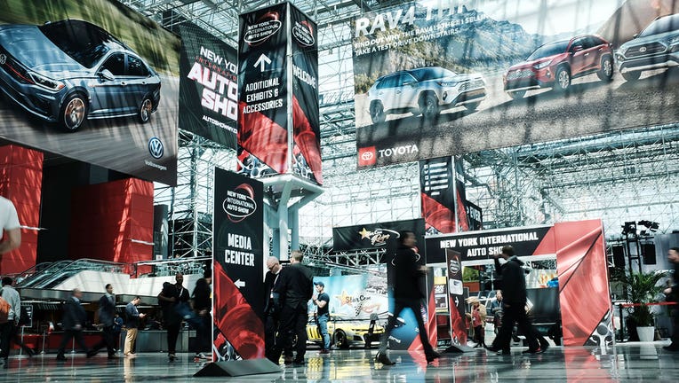 People walk through the New York International Auto Show at the Jacob K. Javits Convention Center on April 17, 2019 in New York City.(Photo by Spencer Platt/Getty Images)