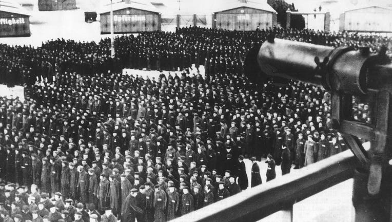 This undated file photo shows a roll call, in the early morning or late evening hours, on the roll call square in front of the camp gate of the Nazi concentration camp Sachsenhausen in Oranienburg on the outskirts of Berlin, Germany.(AP Photo, file)