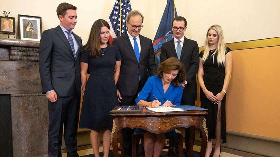 August 24, 2021 - Albany, NY - Governor Kathy Hochul is sworn-in as New York State's 57th Governor by Chief Judge Janet DiFiore during a midnight ceremony at the New York State Capitol. Also pictured are First Gentleman Bill Hochul , Katie Hochul and Matt Gloudeman, and Will and Christina Hochul.