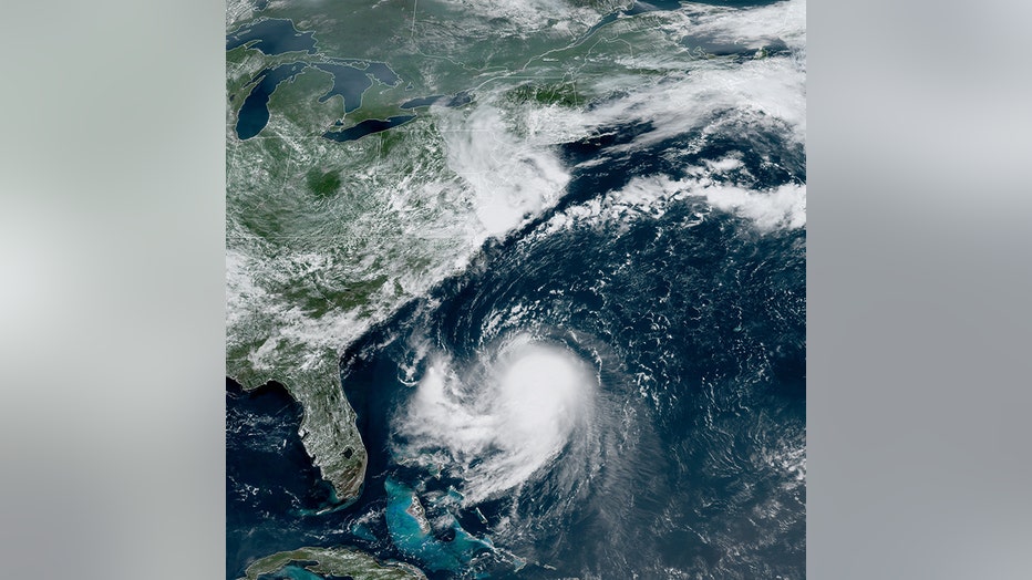 satellite image shows Tropical Storm Henri in the Atlantic Ocean off the Florida Coast